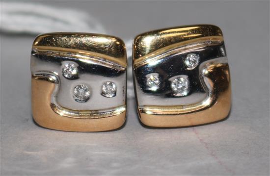 A stylish pair of 18ct two colour gold and diamond set shaped square earrings,